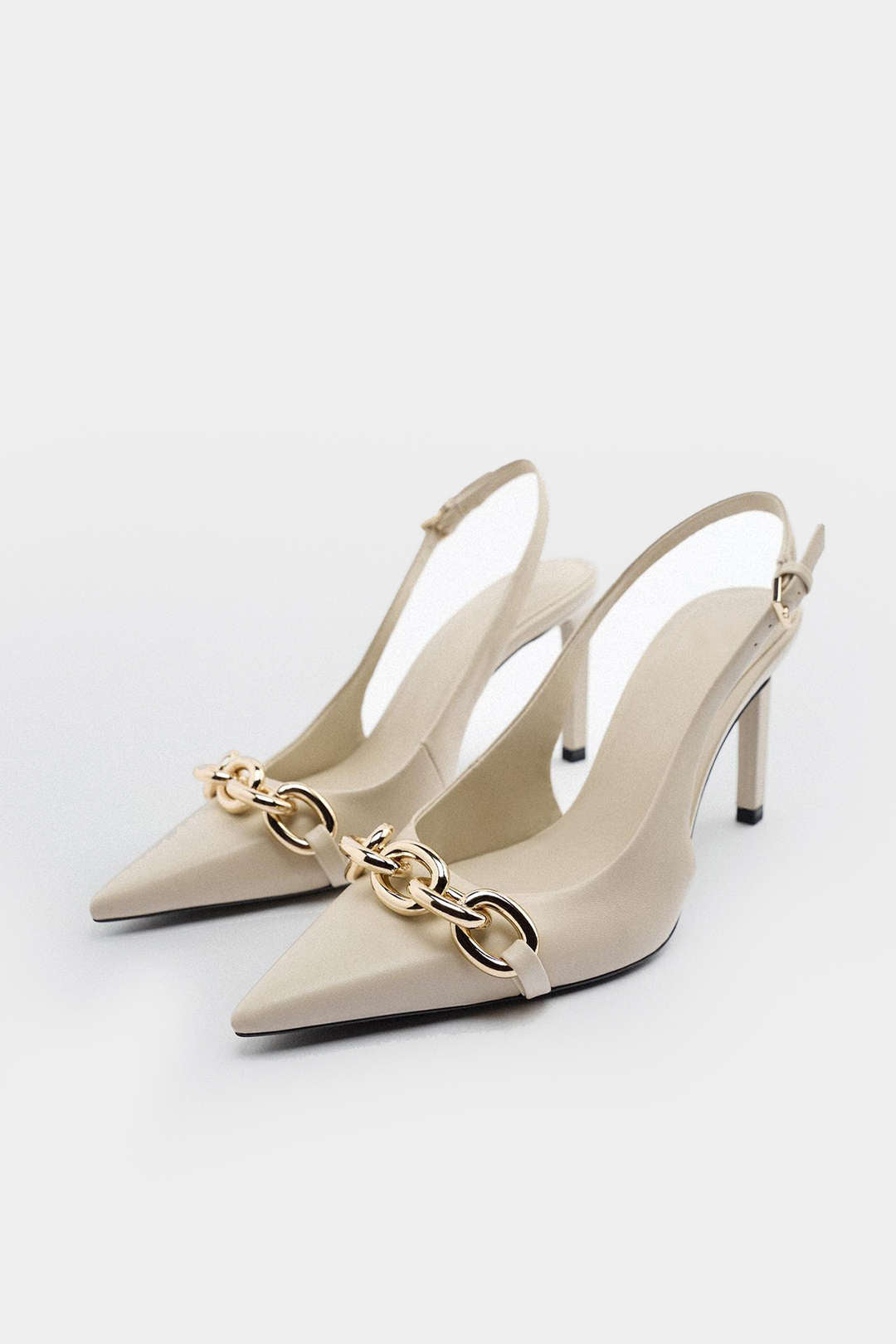 Tacchi Metallici con Catena